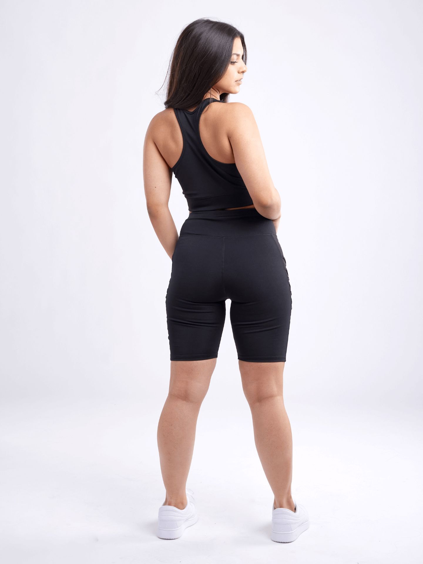 High-Waisted Mid-Thigh Workout Shorts with Pockets & Criss Cross Design Sensual Secret Boutique